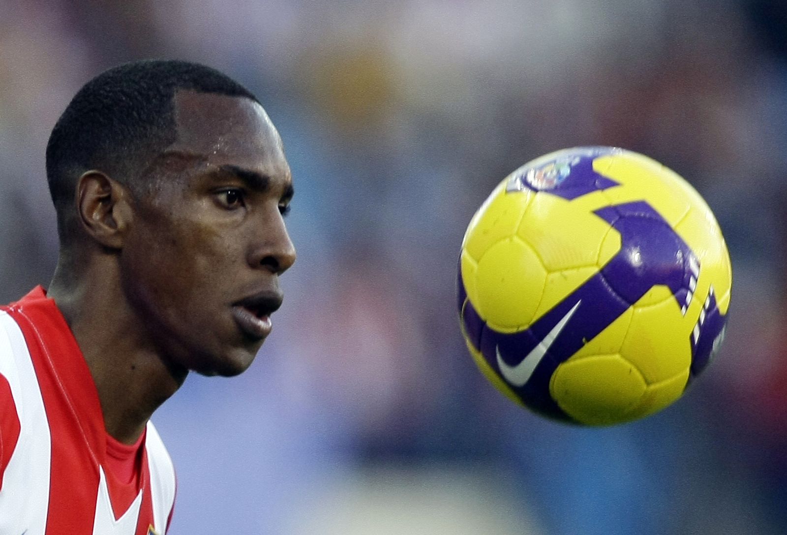 Atletico Madrid's Perea eyes the ball during their Spanish first division soccer match against Deportivo Coruna in Madrid