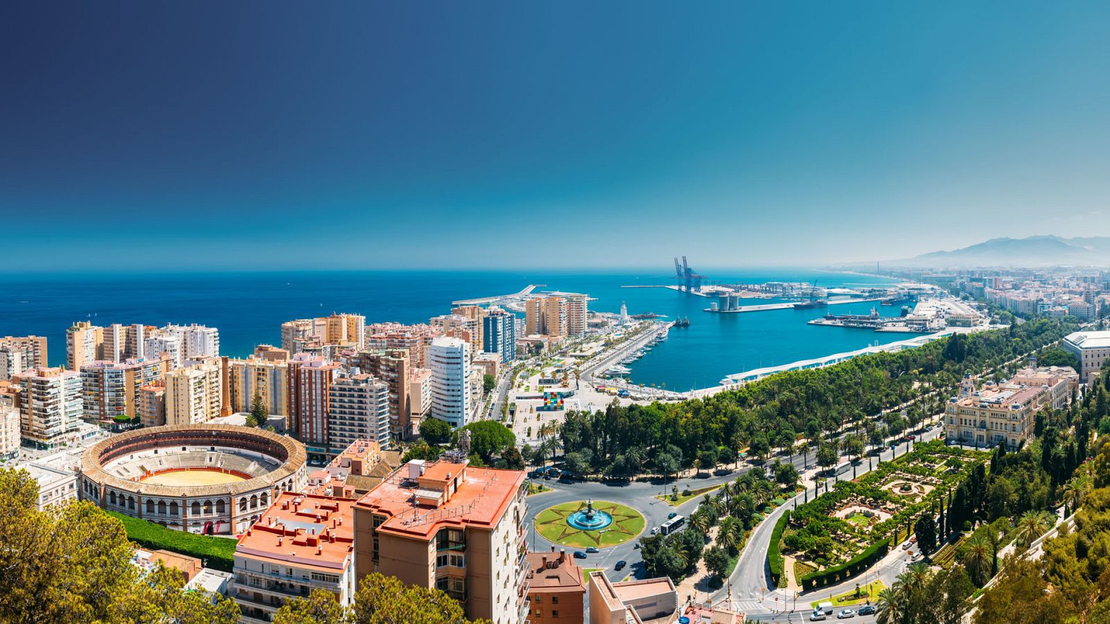 Malaga, Spain. Cityscape View Of Malaga. Plaza De Toros De Ronda Bullring In Malaga, Spain