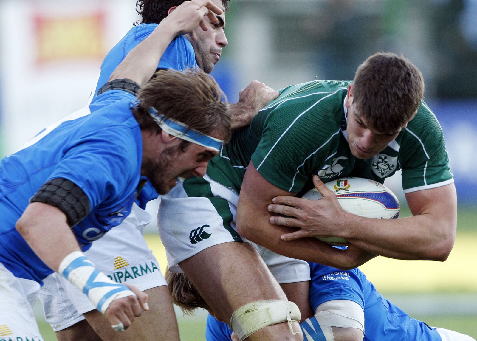 Italy's Reato tackles Ireland's O'Callaghan during their Six Nations rugby union match in Rome