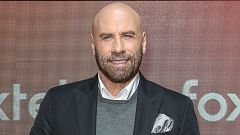 ¿Por qué John Travolta se quedó calvo? Ojito, que Pitbull tiene algo que ver (y no es broma)