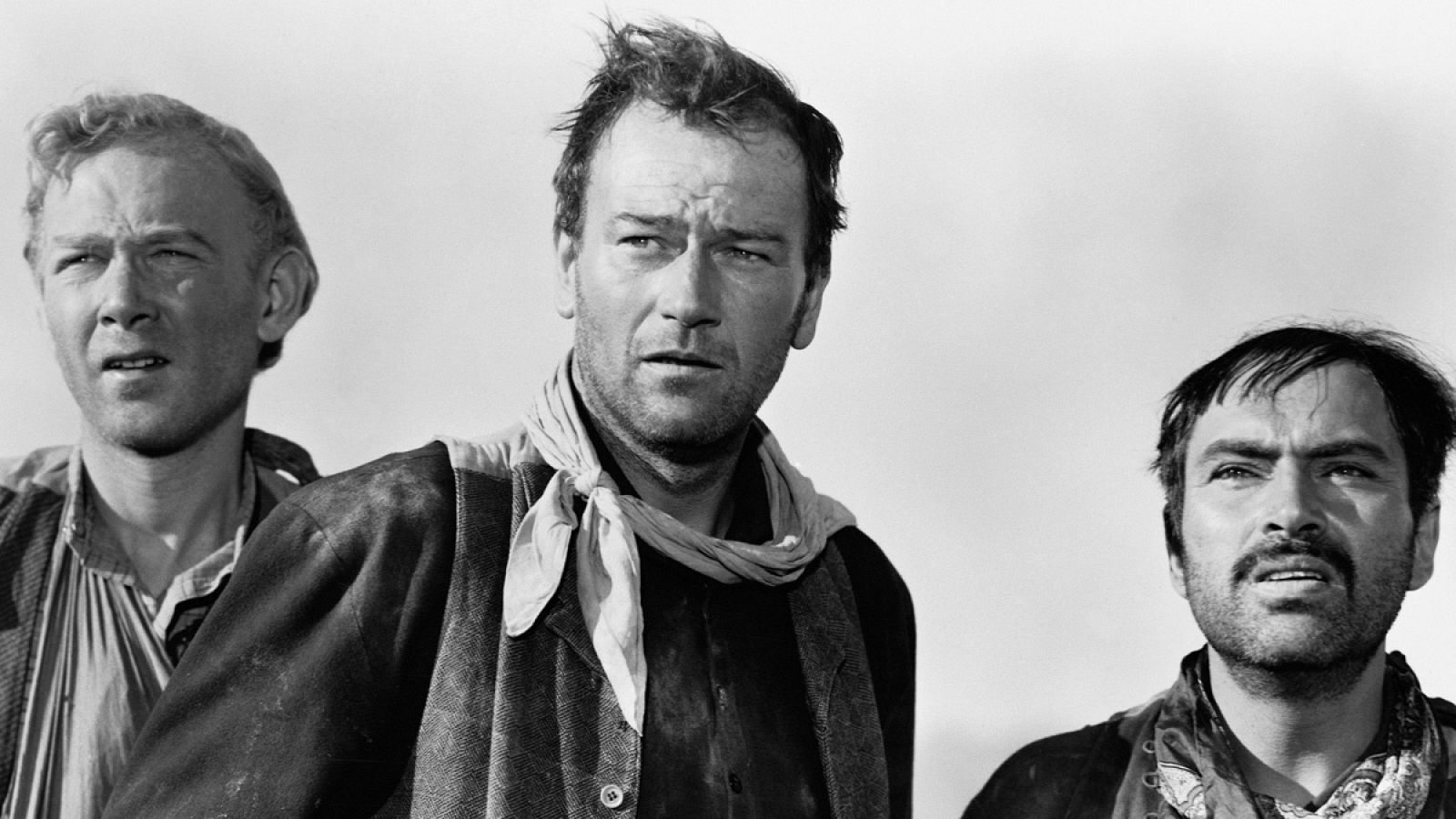 Los tres padrinos: vaqueros del Oeste convertidos en tiernas niñeras