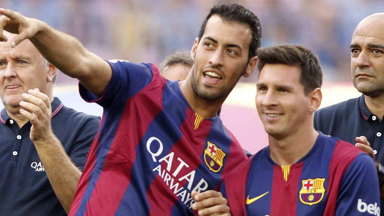 Busquets y Messi