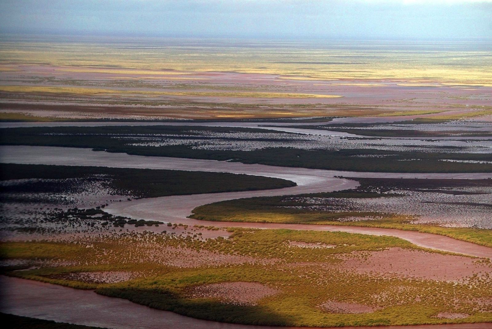 The tidal surge affecting vast parts of the Pilbara region starts to drain back into the ocean after Cyclone Glenda