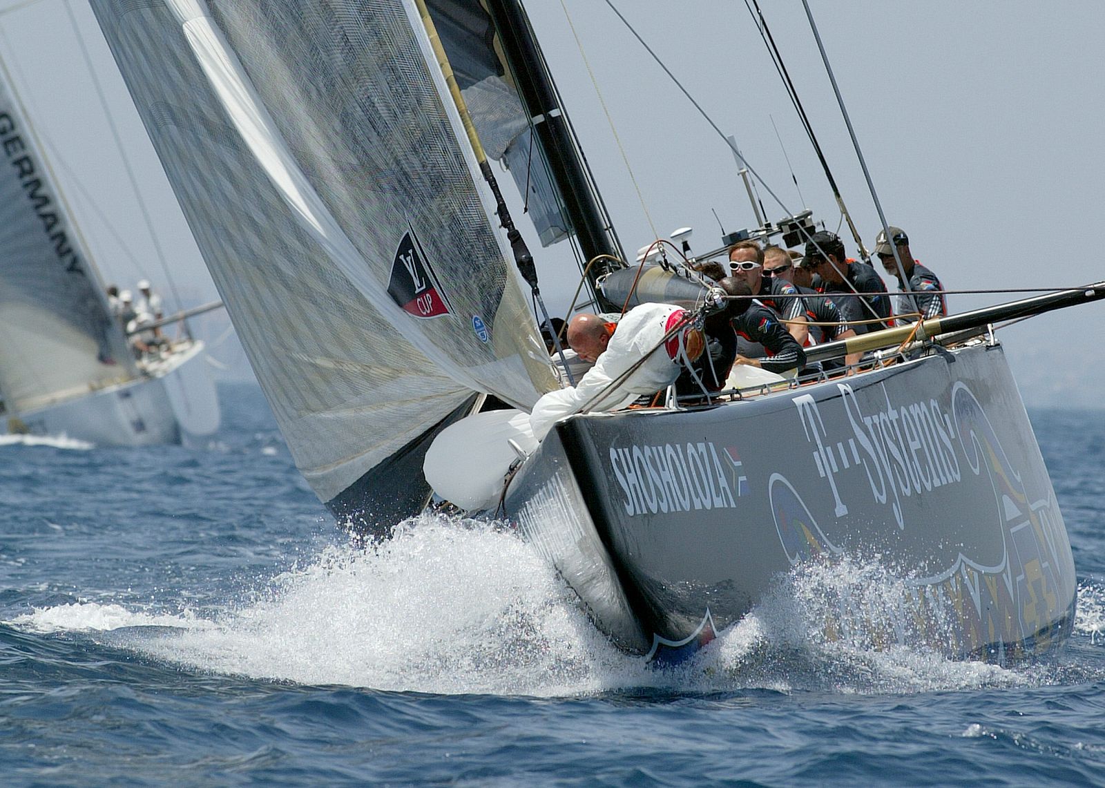 America's Cup challengers Team Shosholoza and United Internet Team Germany sail at the Valencia Louis Vuitton Act 12 in Valencia