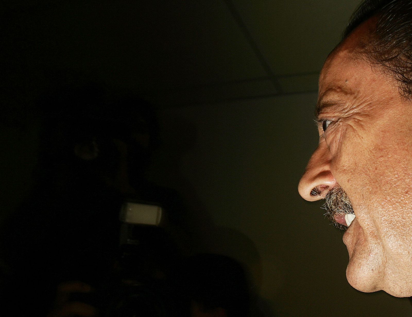 Marbella' s former Mayor Julian Munoz smiles as he arrives at the court in Malaga