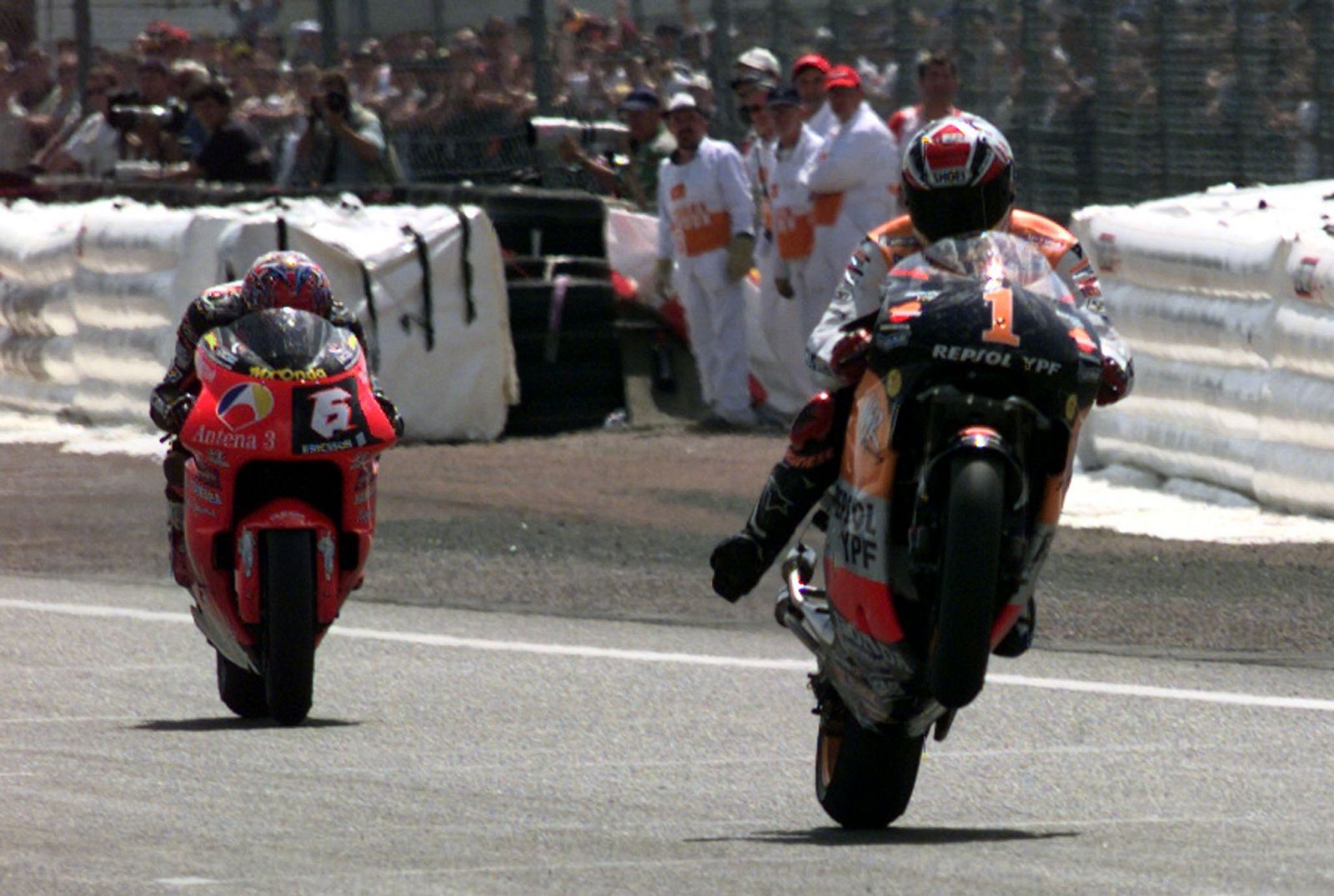 ALEX CRIVILLE OF SPAIN RIDES 500CC HONDA TO VICTORY AT LE MANS MOTORCYCLING RACE.