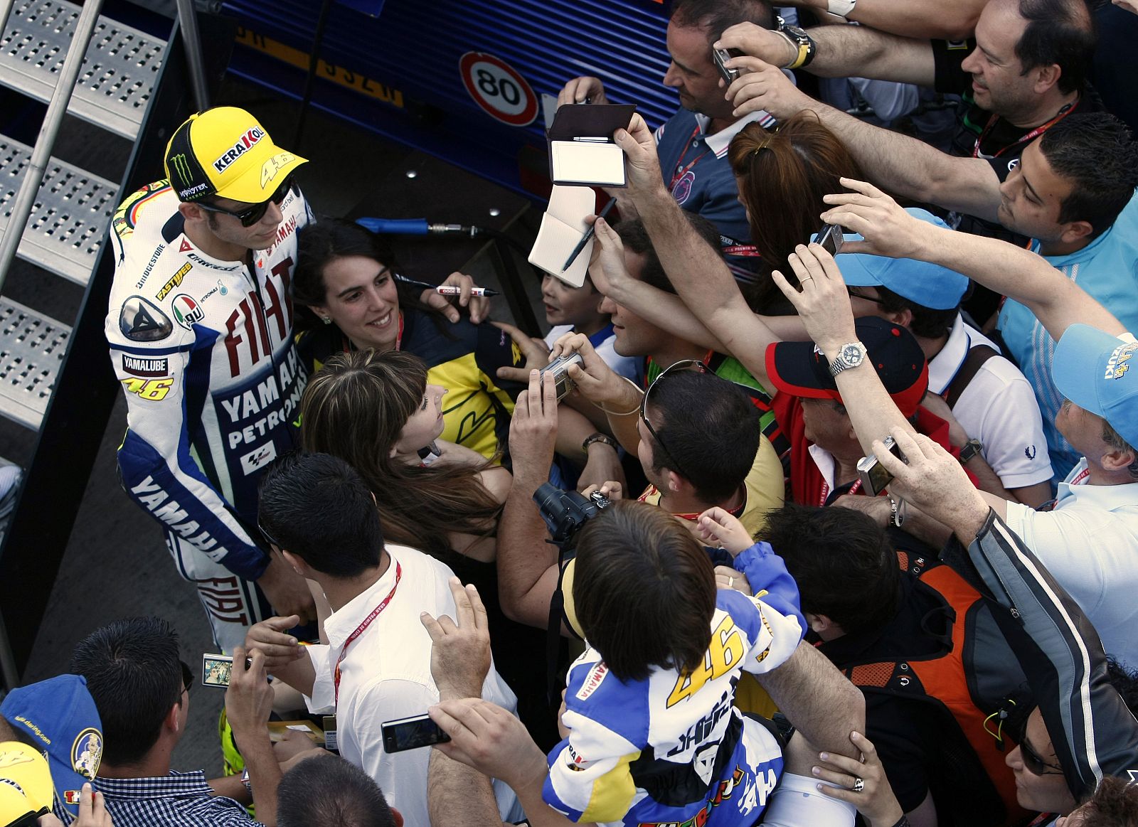 Yamaha MotoGP rider Valentino Rossi of Italy poses for fans in the paddock during the Spanish Grand Prix in Jerez