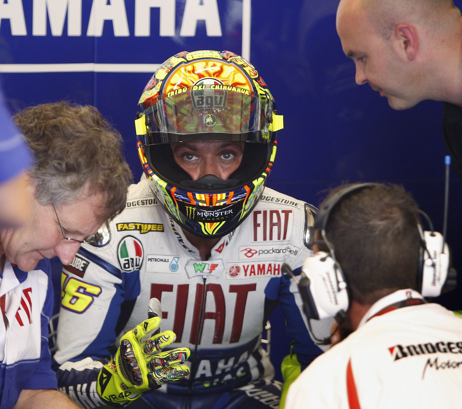 Yamaha MotoGP rider Rossi of Italy speaks to technicians in the pits during the qualifying practice of the Moto GP race of  the Dutch Motorcycling Grand Prix in Assen