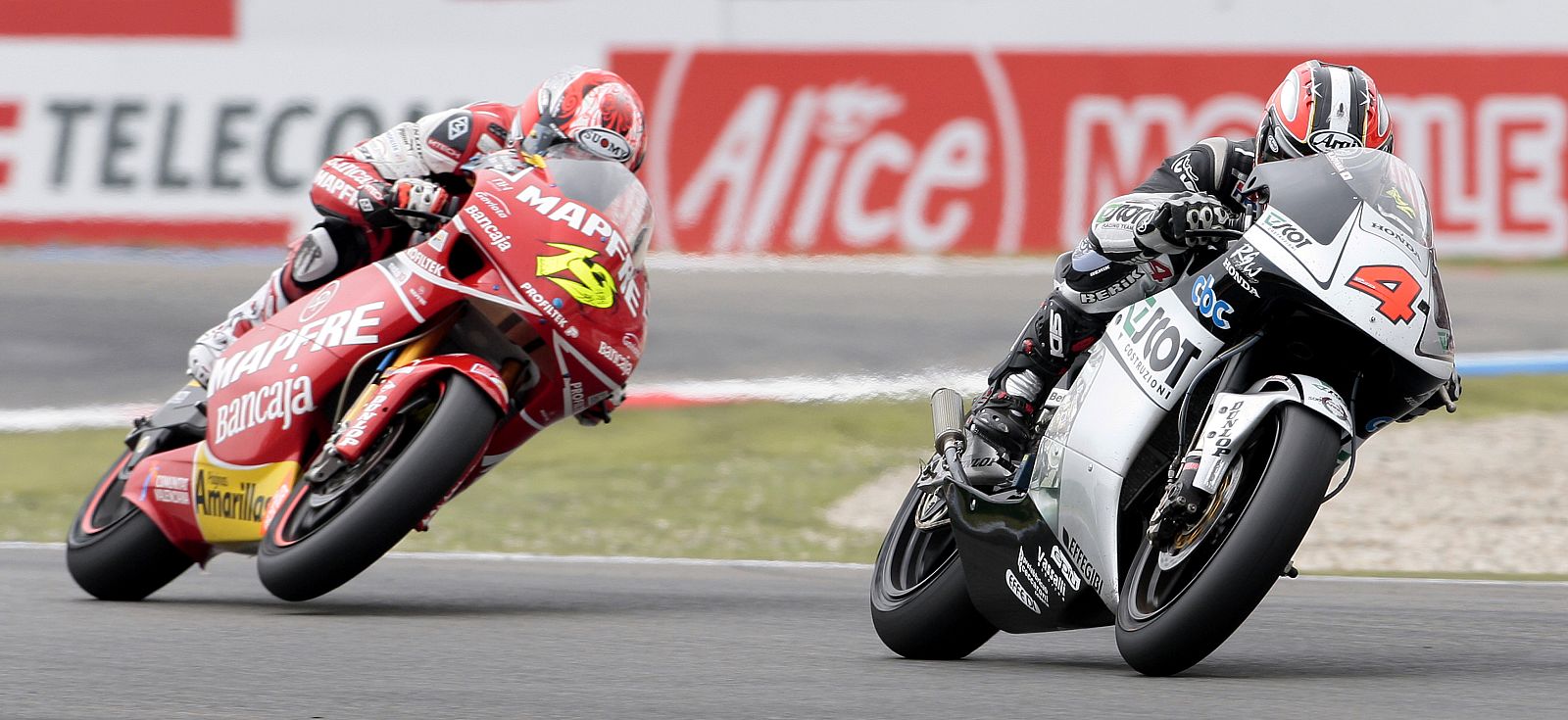 250 cc rider Bautista of Spain follows behind Aoyama of Japan during the Dutch Motorcycling Grand Prix in Assen