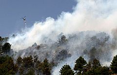 Un incendio obliga a desalojar cuatro urbanizaciones en Collado Mediano