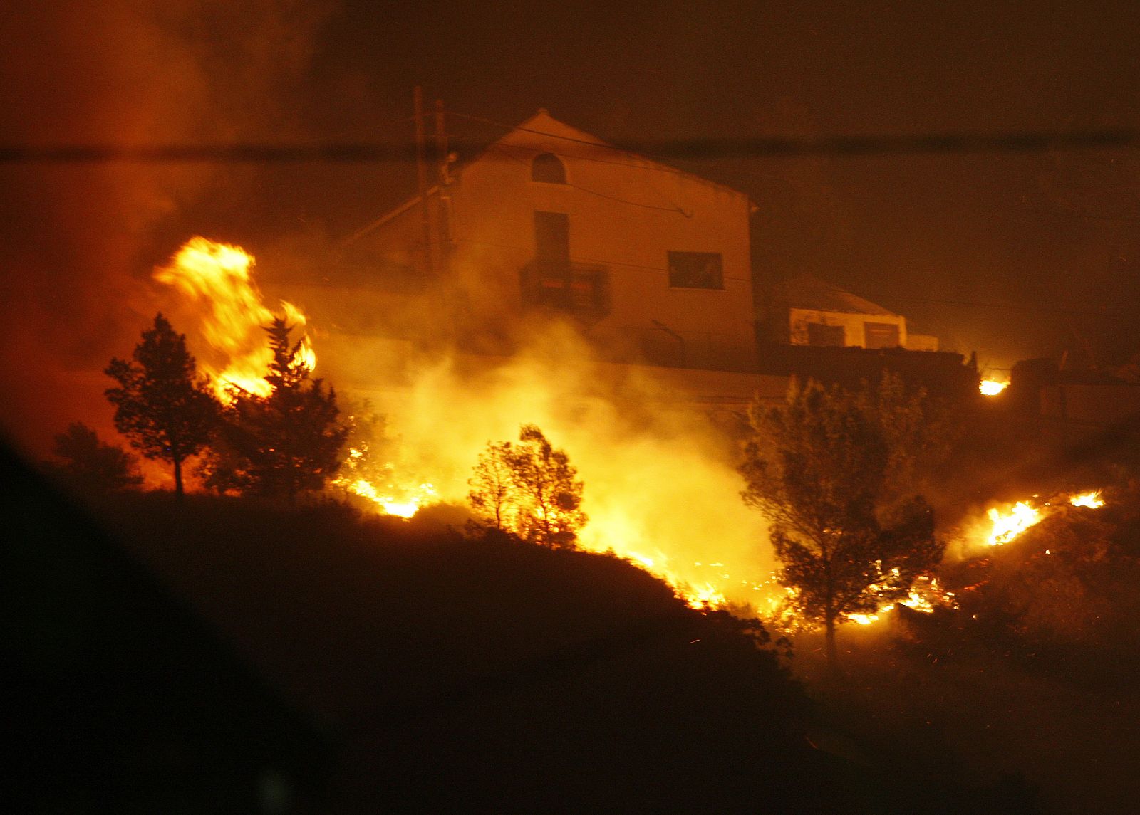A bush fire threatens residences in the southern French city of Marseille