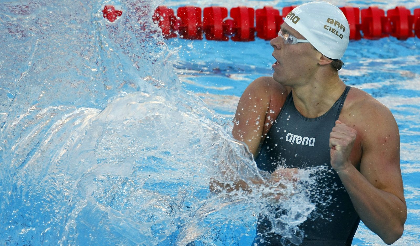 Filho celebrates after winning and setting a world record in the men's 100m freestyle swimming final at the World Championships in Rome