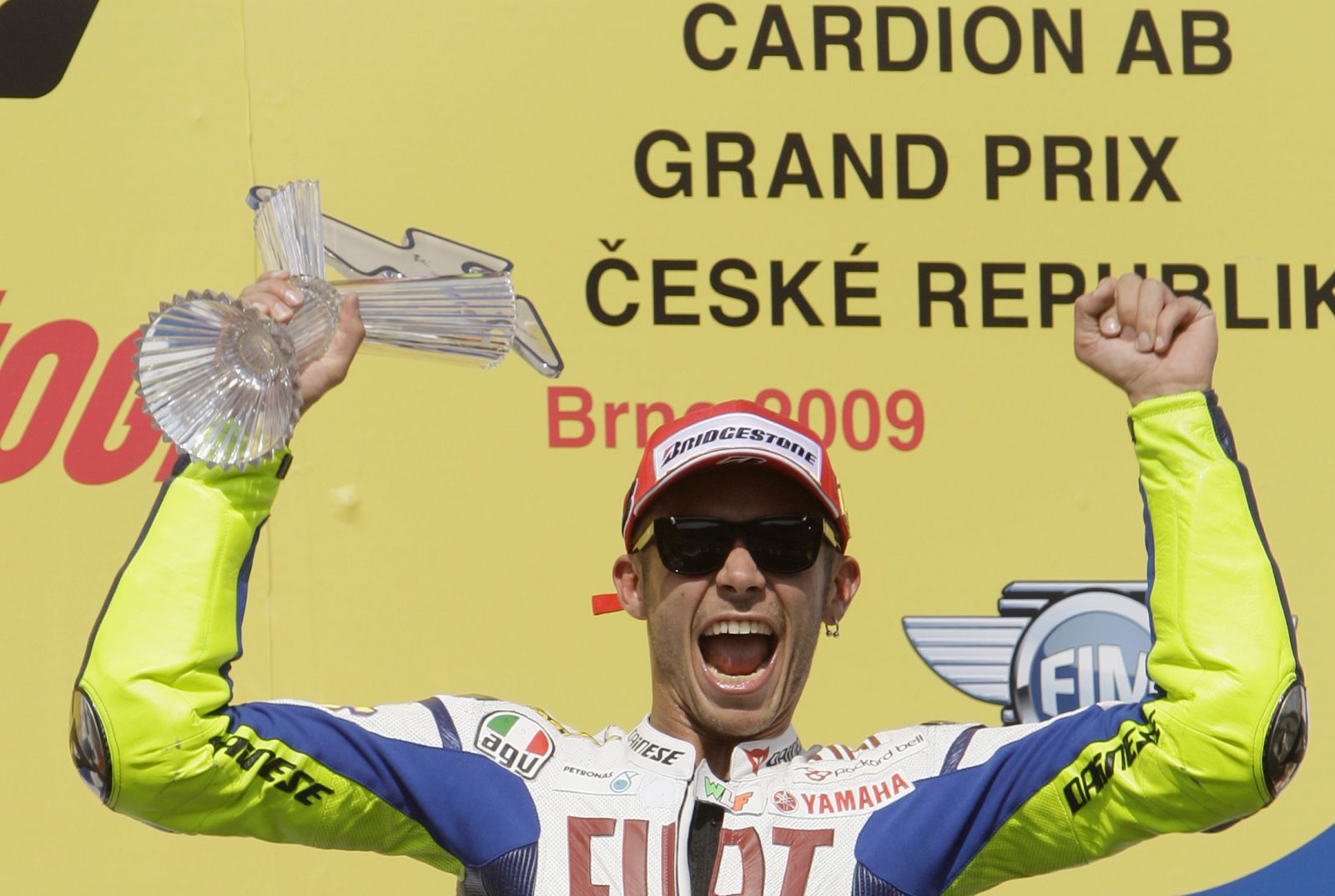 Yamaha's Valentino Rossi of Italy celebrates after winning the Czech Motorcycling Grand Prix at the Masaryk circuit in Brno