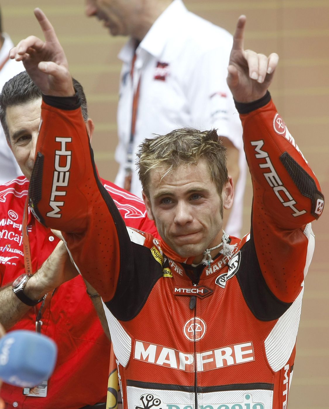 Aprilia 250cc rider Bautista of Spain gestures to supporters after winning the 250cc category of the Catalunya Motorcycling Grand Prix at Montmelo racetrack
