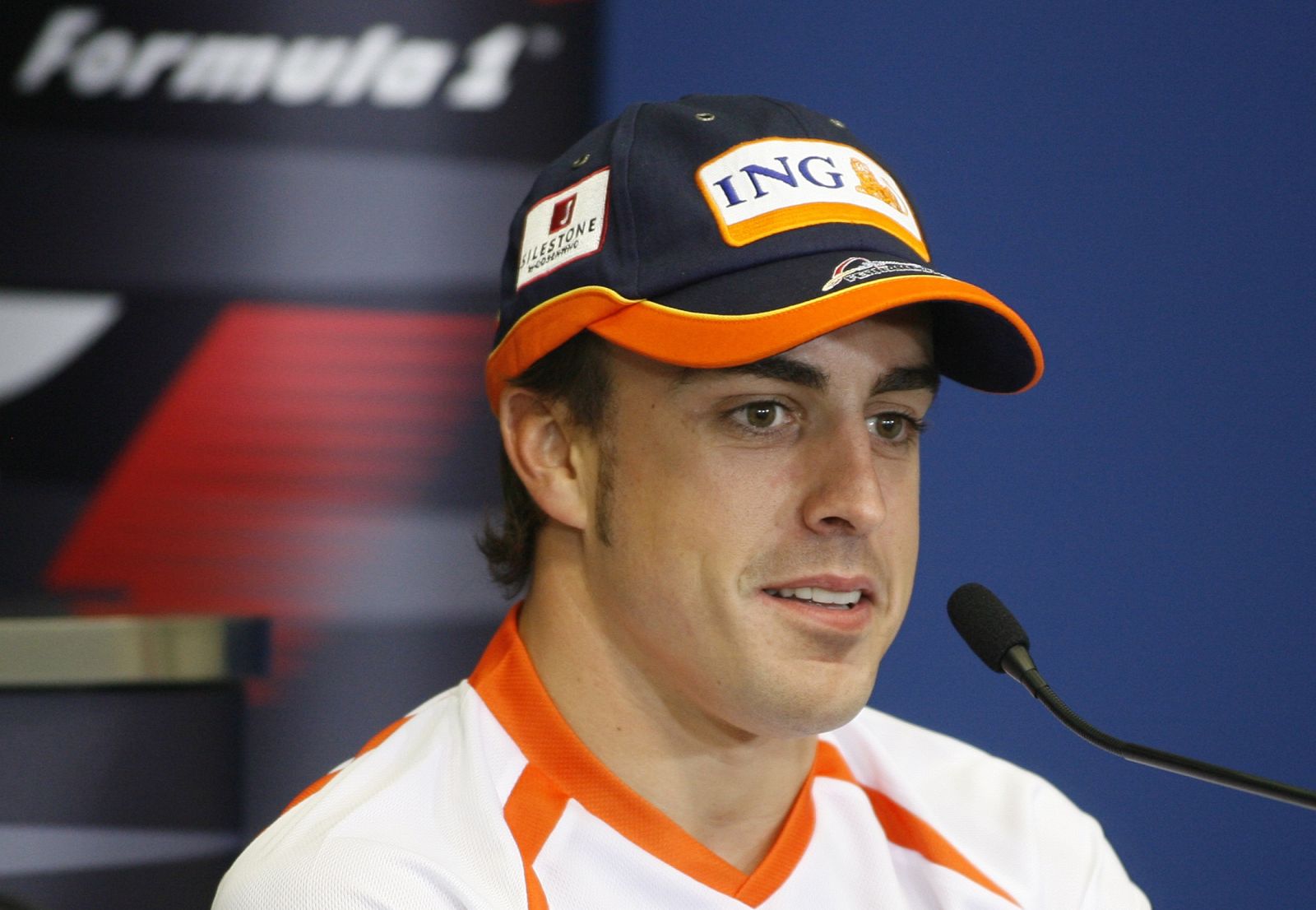 Renault's Formula One driver Alonso of Spain speaks during a news conference ahead European Grand Prix in Valencia