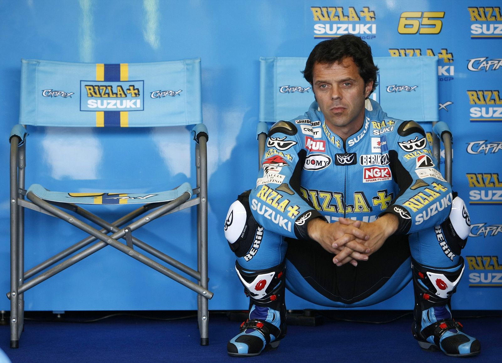 Suzuki MotoGP rider Loris Capirossi of Italy stretches in the pit area during the Spanish Grand Prix in Jerez