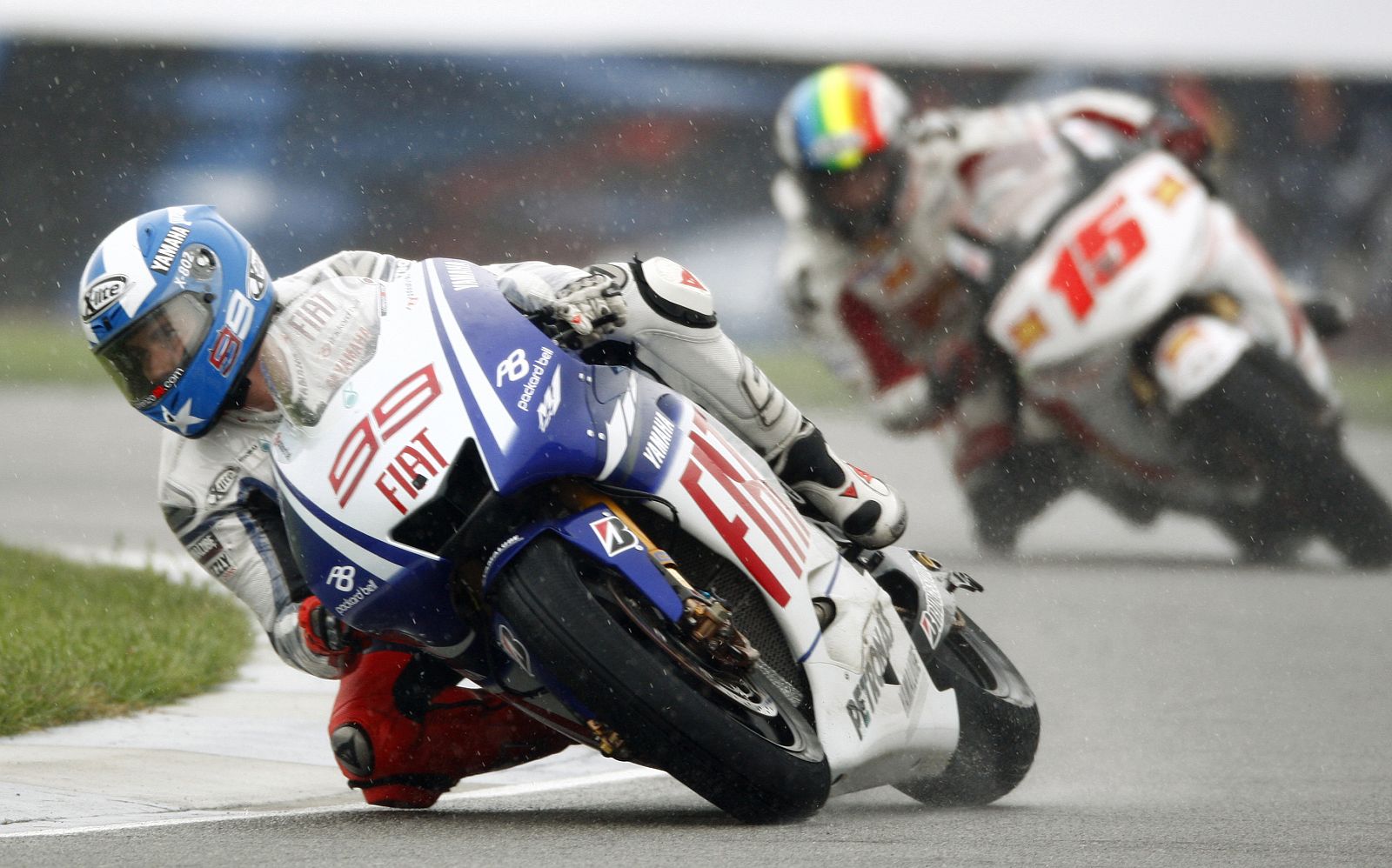 Jorge Lorenzo and Alex De Angelis practice in the rain for the Indianapolis Grand Prix at the Indianapolis Motor Speedway