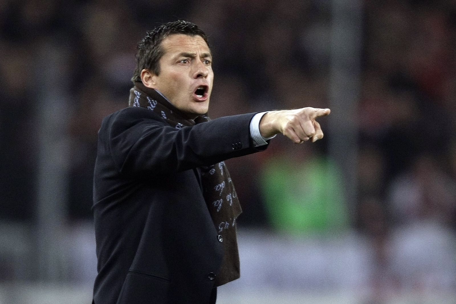 Partizan Belgrade's coach Jokanovic reacts during his team's UEFA cup soccer match against VfB Stuttgart in Stuttgart