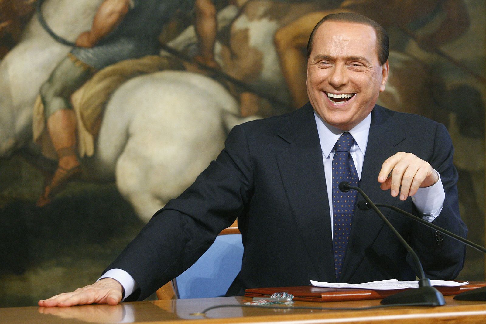 Italian PM Berlusconi smiles during his meeting with Pakistani President Zardari in Rome