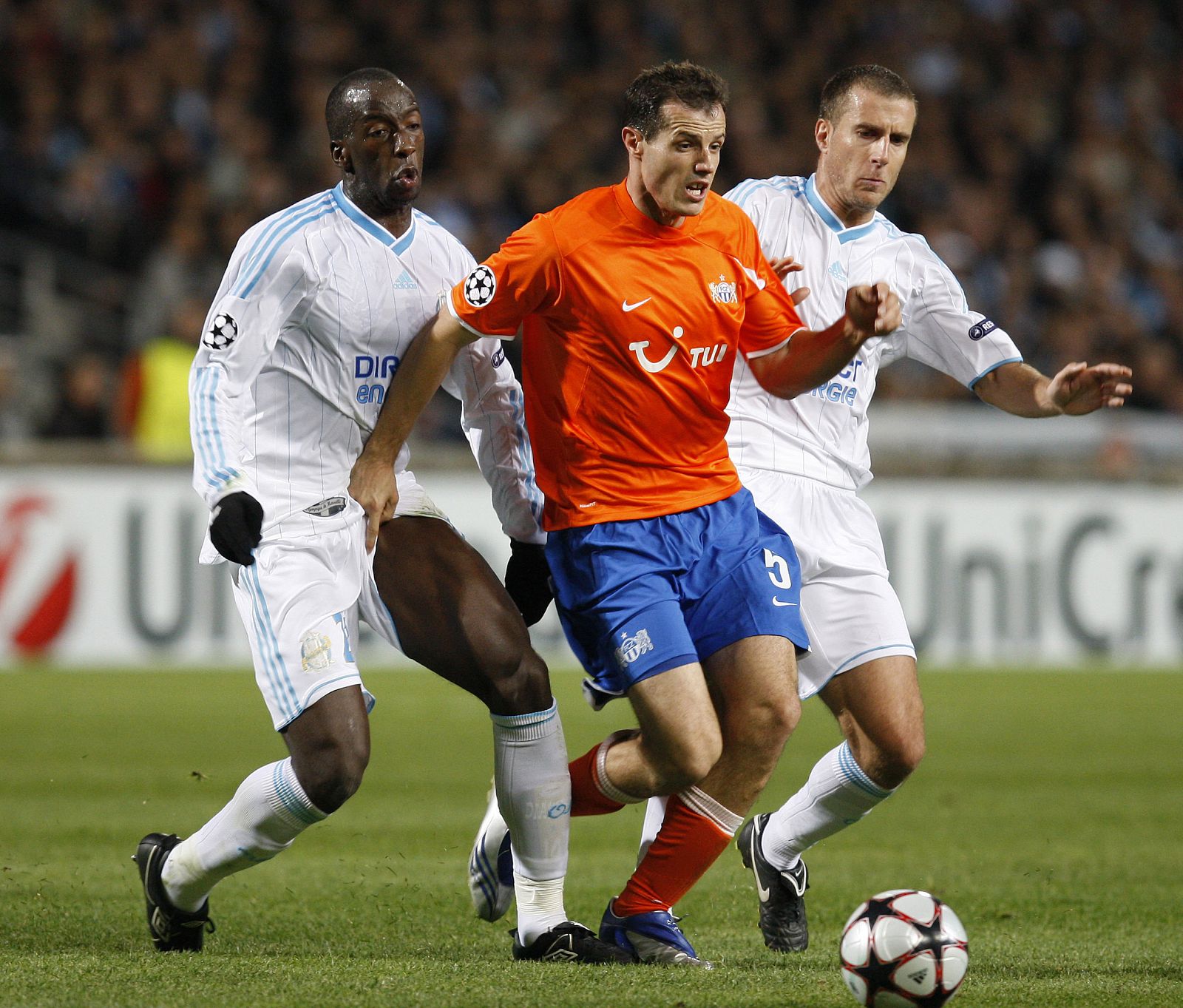 FC Zurich's Margairaz challenges Olympique Marseille?s Cheyrou and Diawara during their Champions League soccer match at the Velodrome Stadium in Marseille
