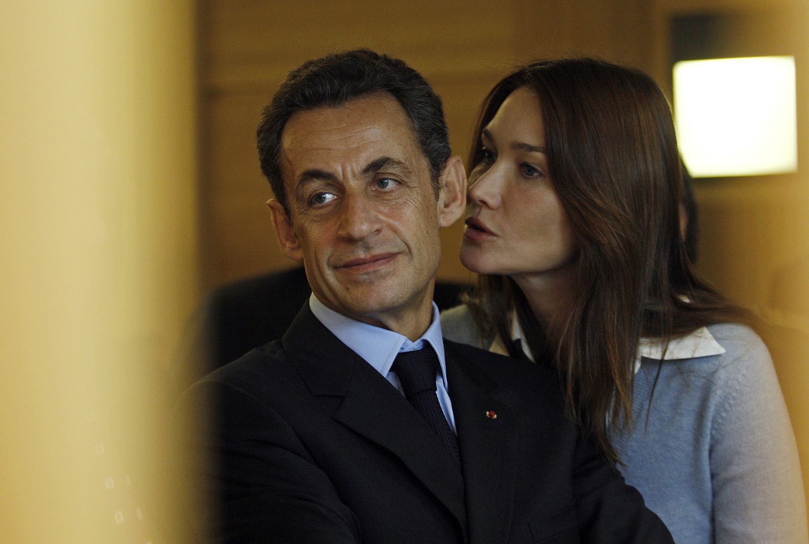 France's President Sarkozy listens to explanations by the hospital staff during visit to the Paoli-Calmettes Institute in Marseille