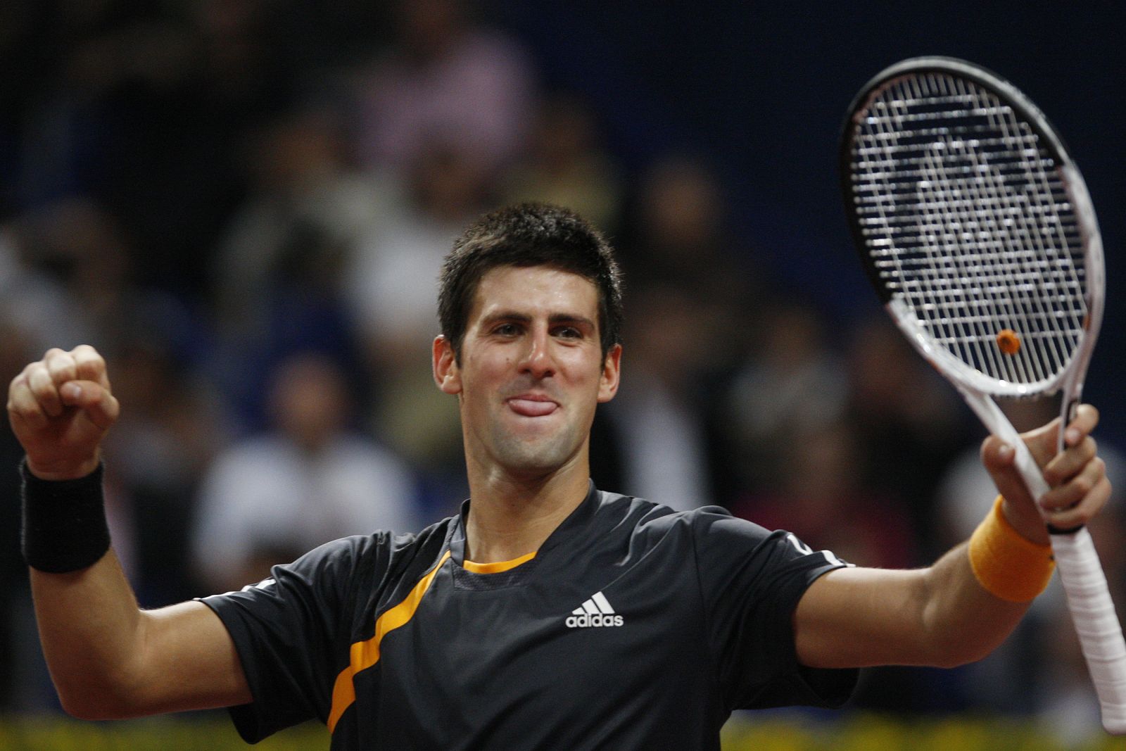 Serbia's Djokovic reacts after winning the final match against Switzerland's Federer at the Swiss Indoors ATP tennis tournament in Basel