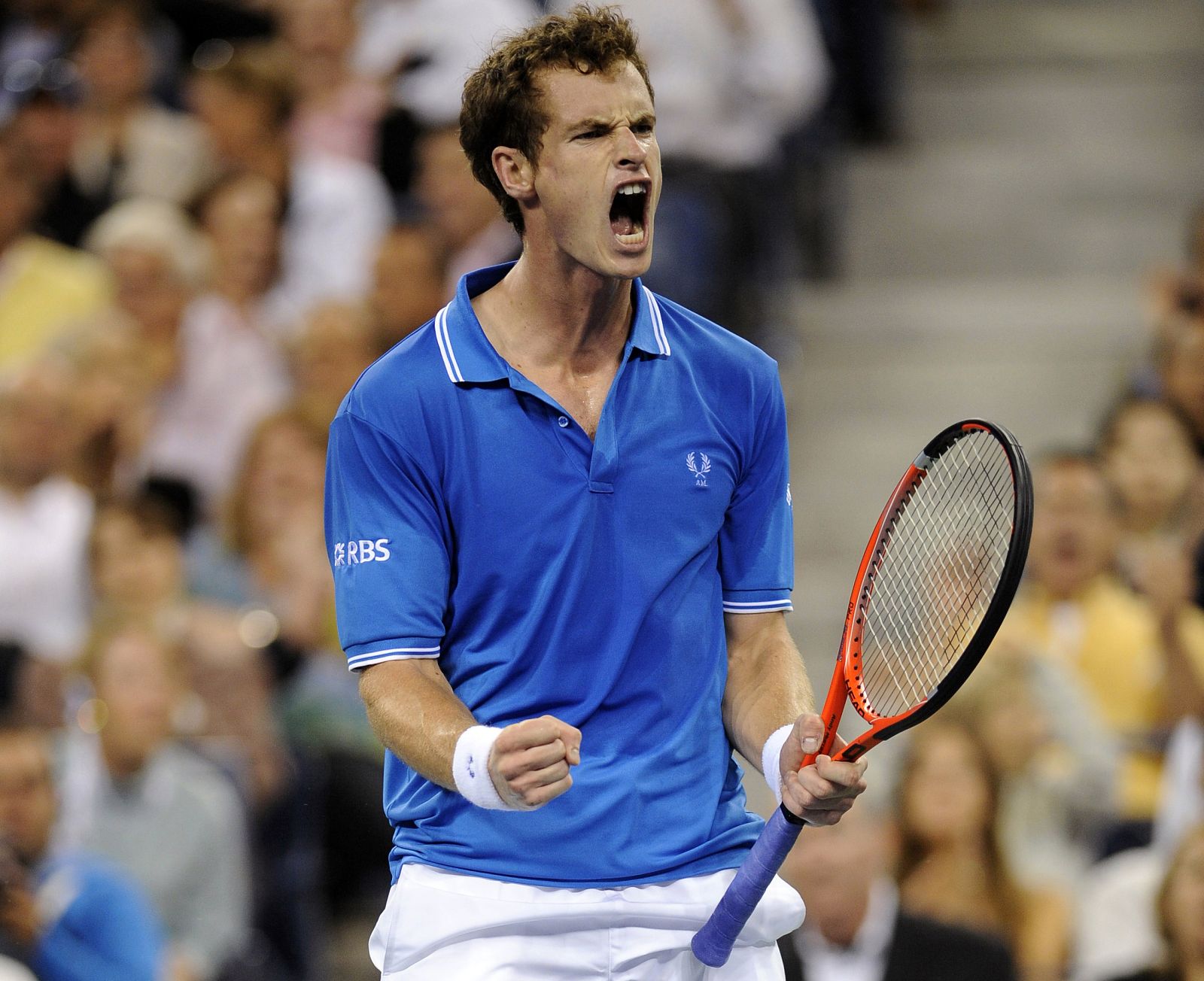 Murray of Britain reacts after winning the first set against Gulbis of Latvia during their match at the U.S. Open tennis tournament in New York