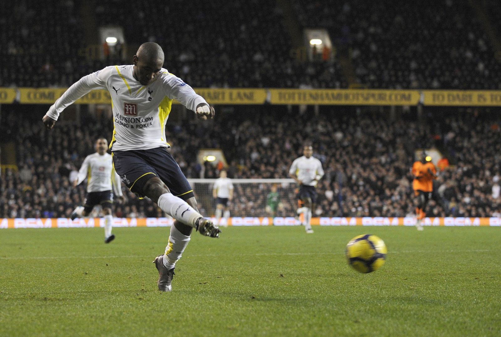 Tottenham's Jermain Defoe scores his second goal against Wigan during their English Premier League soccer match at White Hart Lane in London