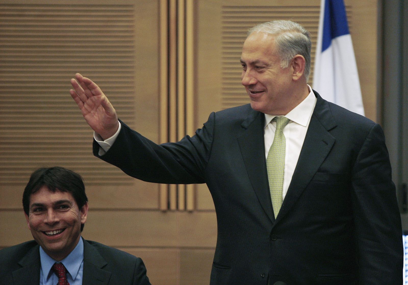 Israel's PM Netanyahu gestures upon arrival for Likud party meeting at Knesset in Jerusalem