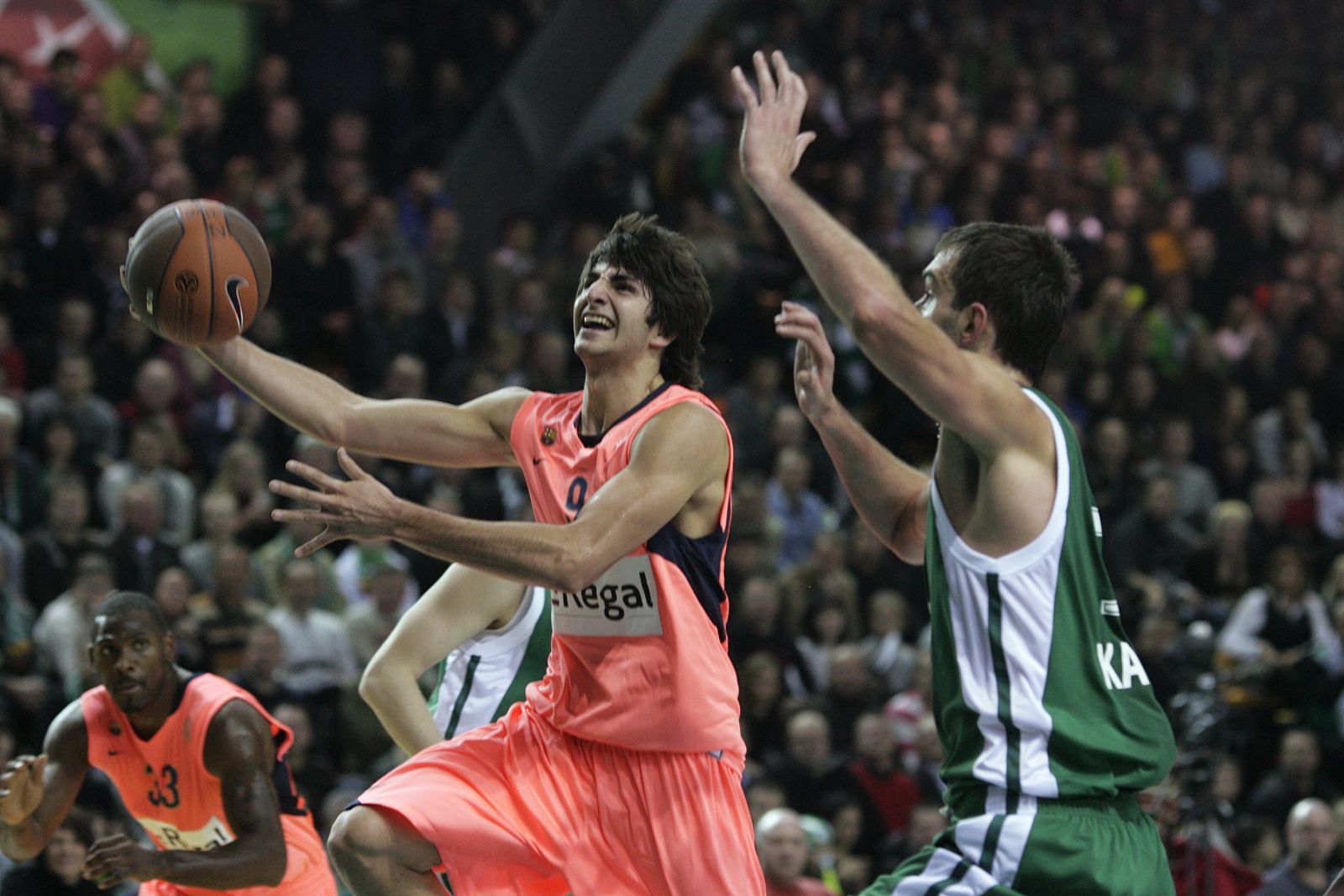 Rubio of Regal FC Barcelona goes for basket past Begic of Zalgiris during their Euroleague basketyball game in Kaunas