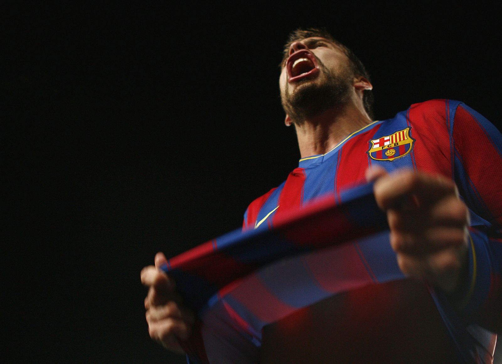Barcelona's Pique celebrates after scoring against Inter Milan during their Champions League soccer match in Barcelona