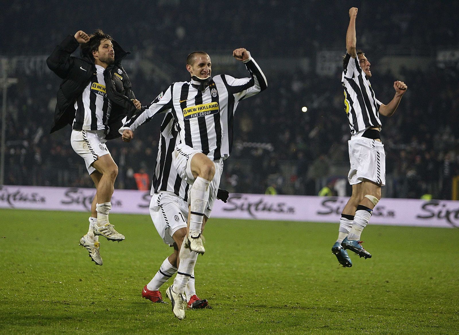 Juventus' players celebrate at the end of their Italian Serie A soccer match against Inter Milan at the Olympic stadium in Turina