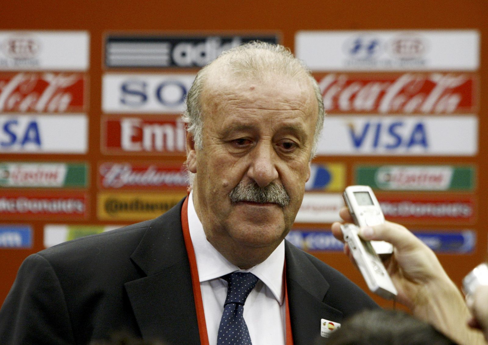 Spain's national soccer coach del Bosque speaks to the media after the draw for the 2010 World Cup in Cape Town