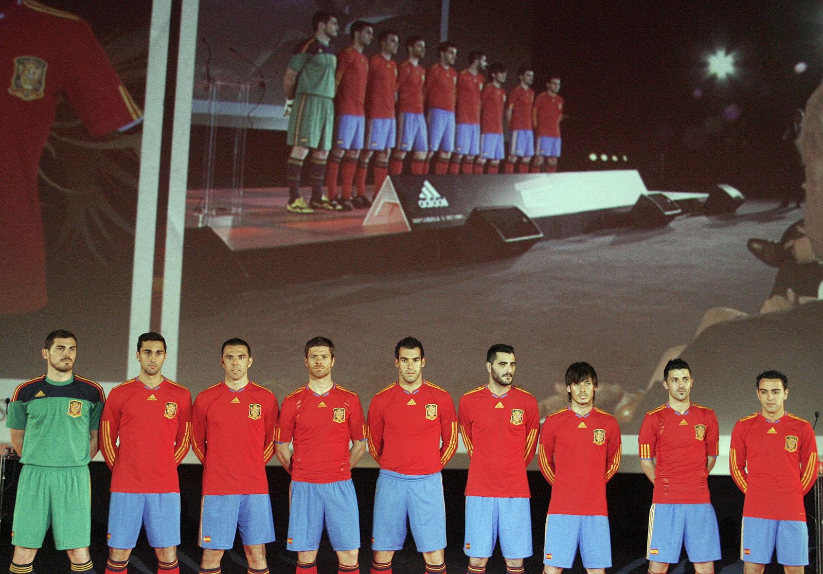 Spanish soccer players present the new designer national soccer team jersey during a media presentation in Madrid