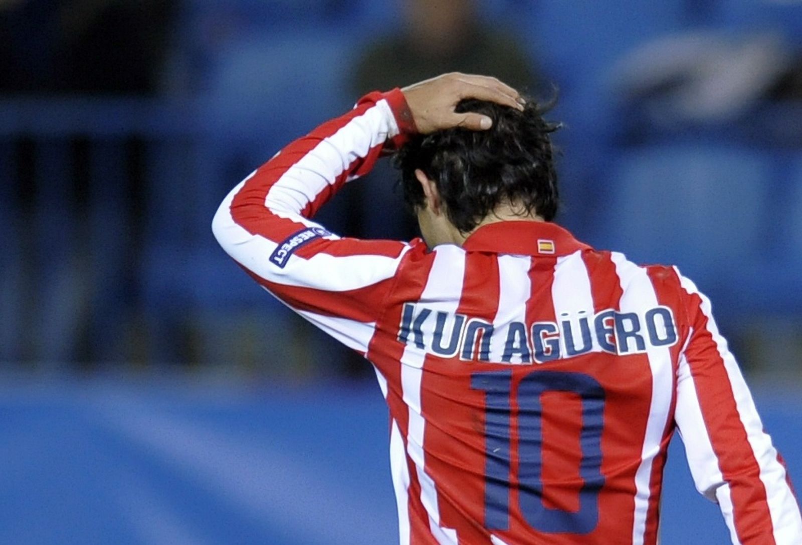 Atletico Madrid's Aguero reacts after losing chance to score against Porto during their Champions League soccer match in Madrid
