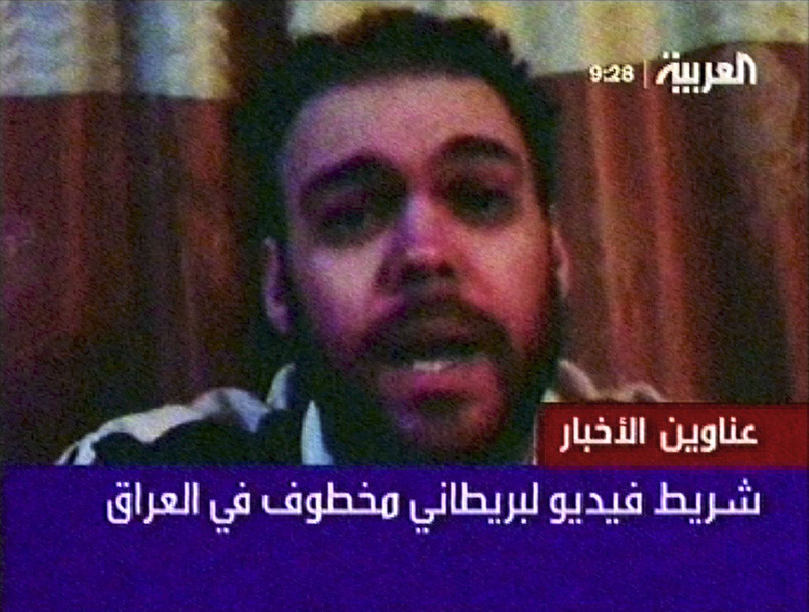 File video grab of man who identified himself as Peter Moore in a video released by Al Arabiya