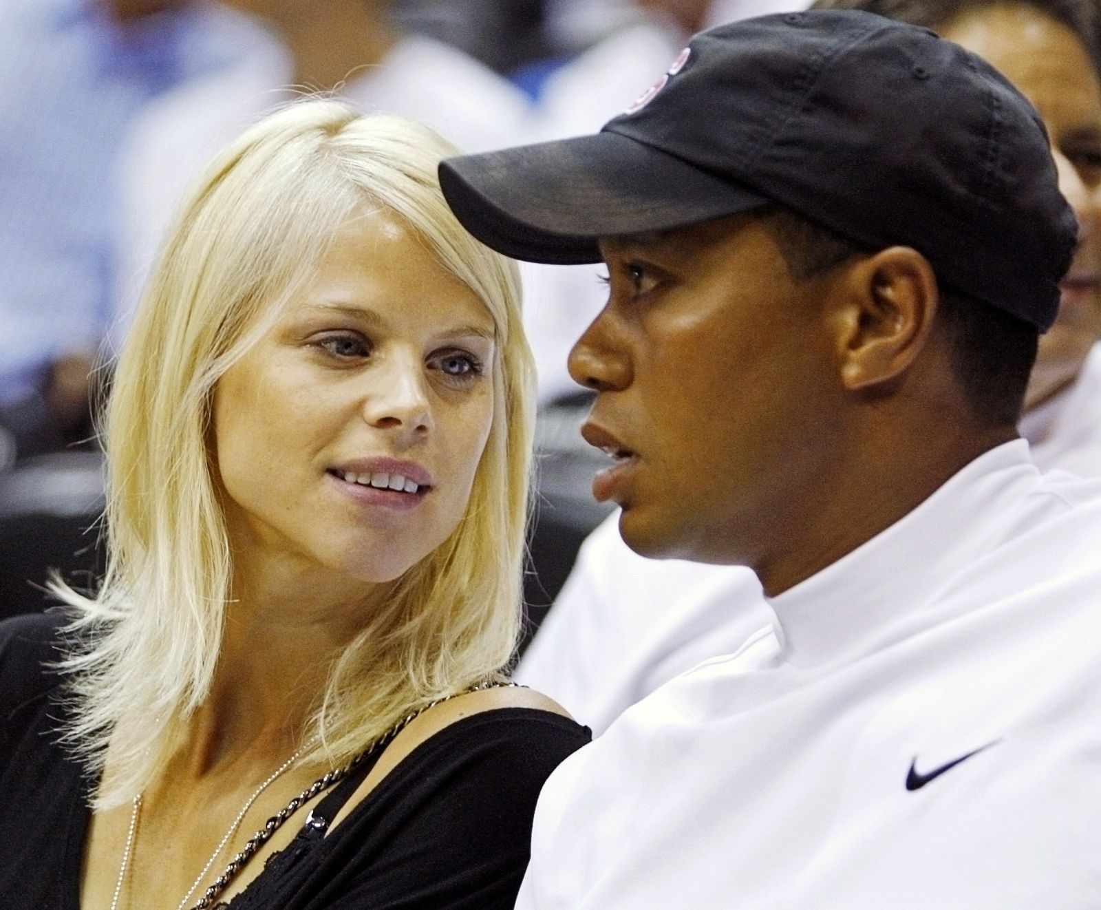 File photo of Tiger Woods and Elin Nordegren at an NBA basketball game in Orlando