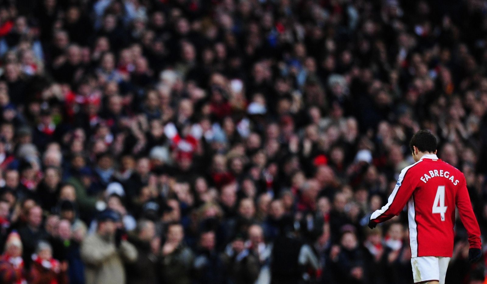 Arsenal's Cesc Fabregas walks off after being substituted during their English Premier League soccer match against Aston Villa at the Emirates Stadium in London