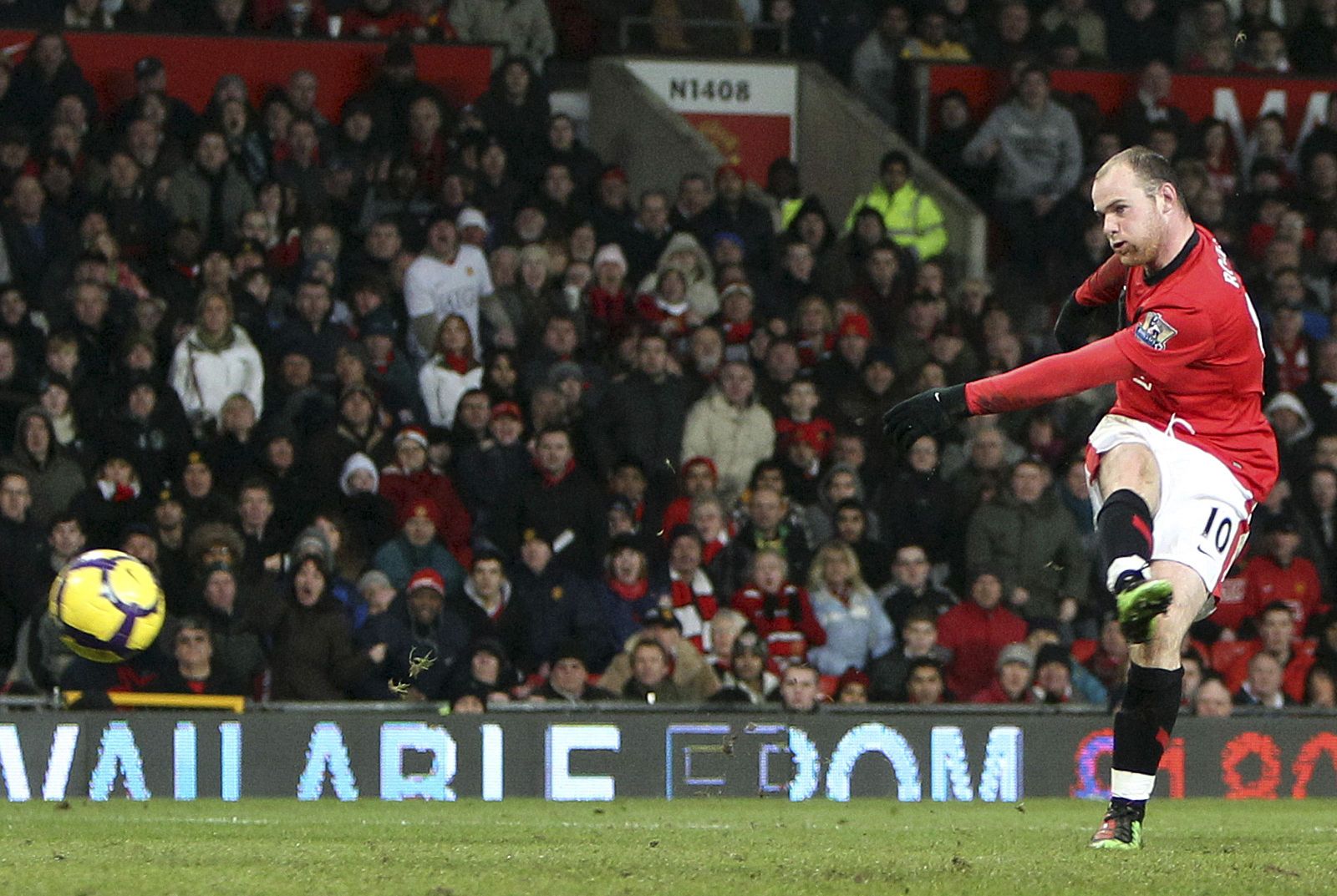 Manchester United's Rooney scores his second goal against Hull City during their English Premier League soccer match in Manchester