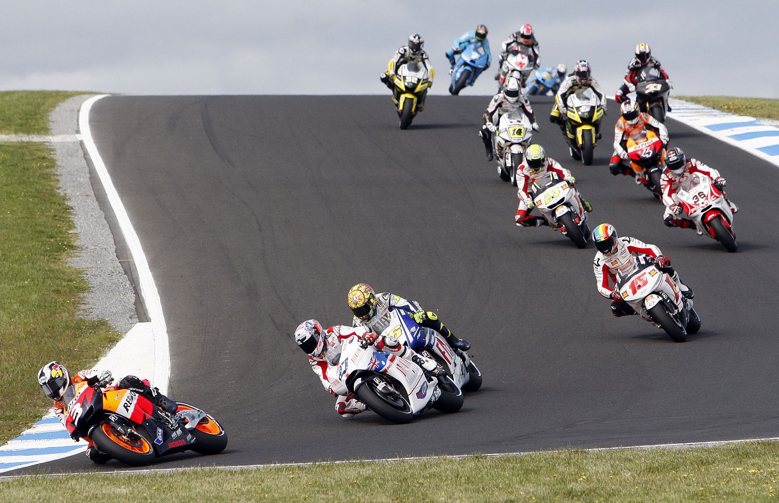 Honda MotoGP rider Pedrosa of Spain leads the first lap at the Australian Grand Prix