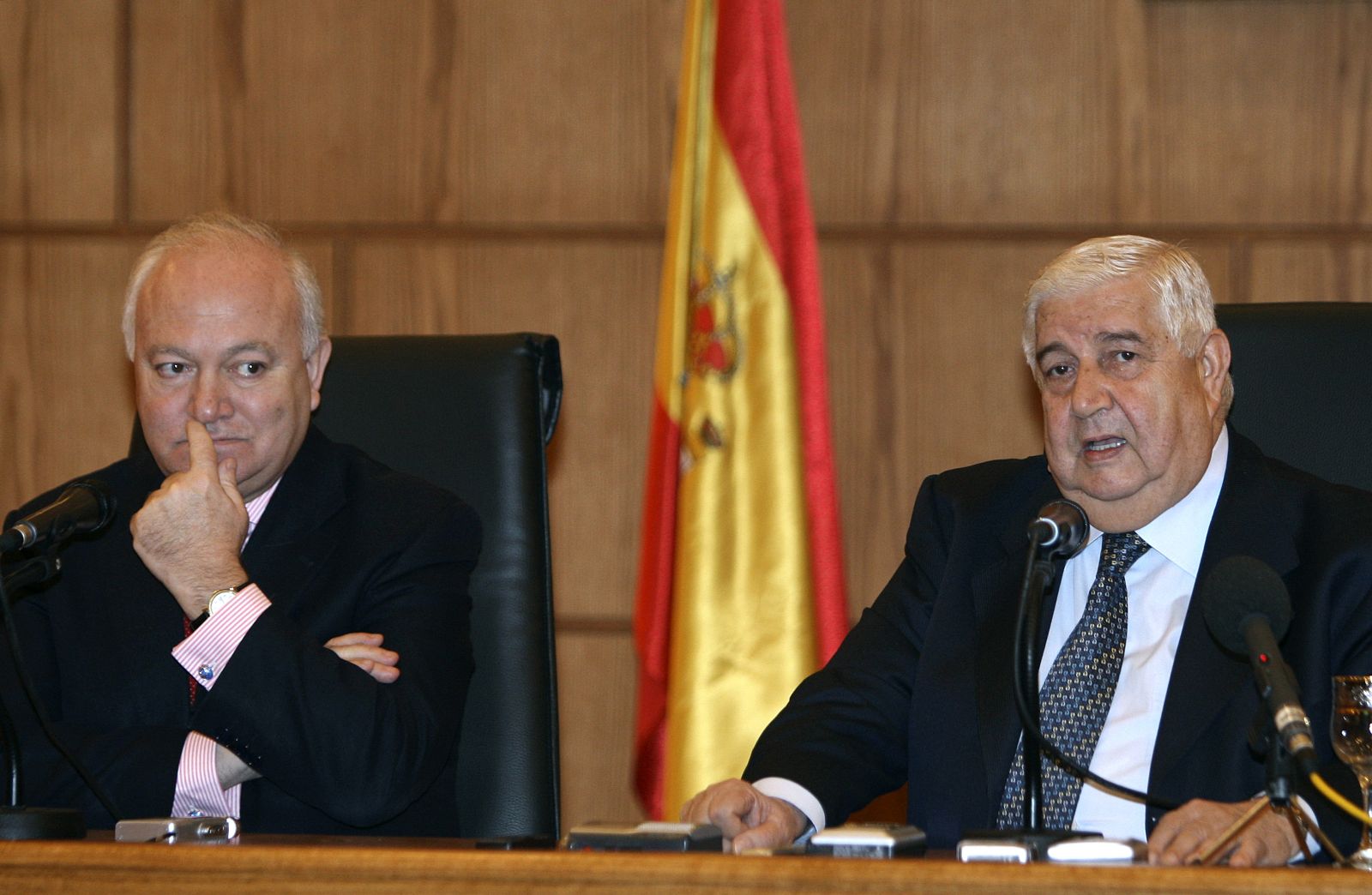 Syria's Foreign Minister Moallem and his Spanish counterpart Moratinos attend a news conference in Damascus
