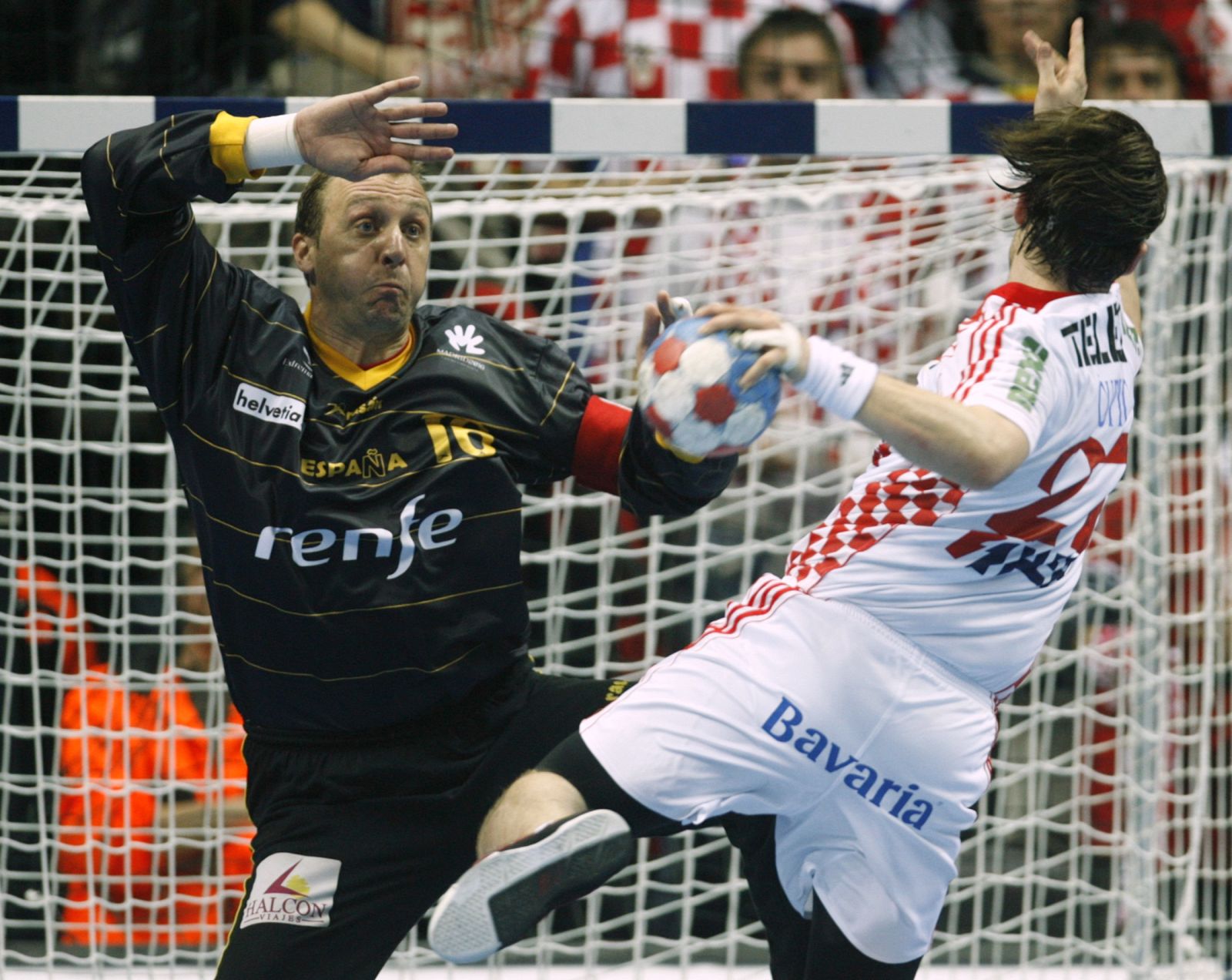 Croatia's Cupic tries to score next to Spain's Bofill during their Men's World Handball Championship preliminary Group B match in Split