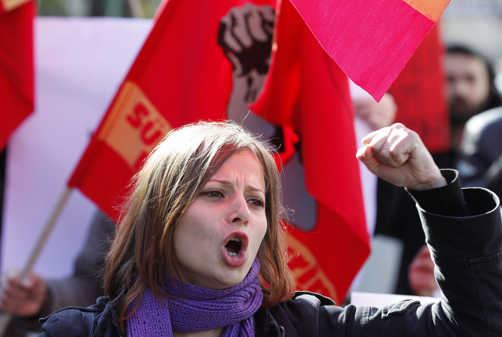 A protester shouts slogans during a protest in front of the Iranian Embassy in Ankara