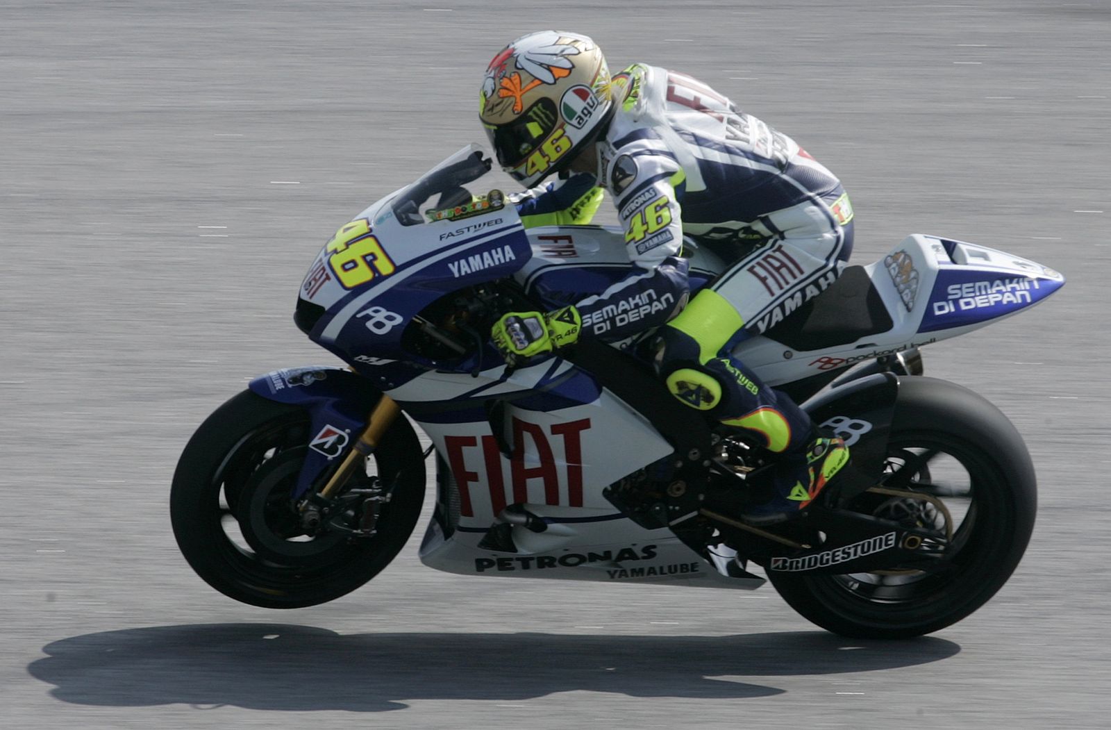 Yamaha MotoGP rider Rossi of Italy powers his machine during the 2010 pre-season test at Sepang circuit outside Kuala Lumpur