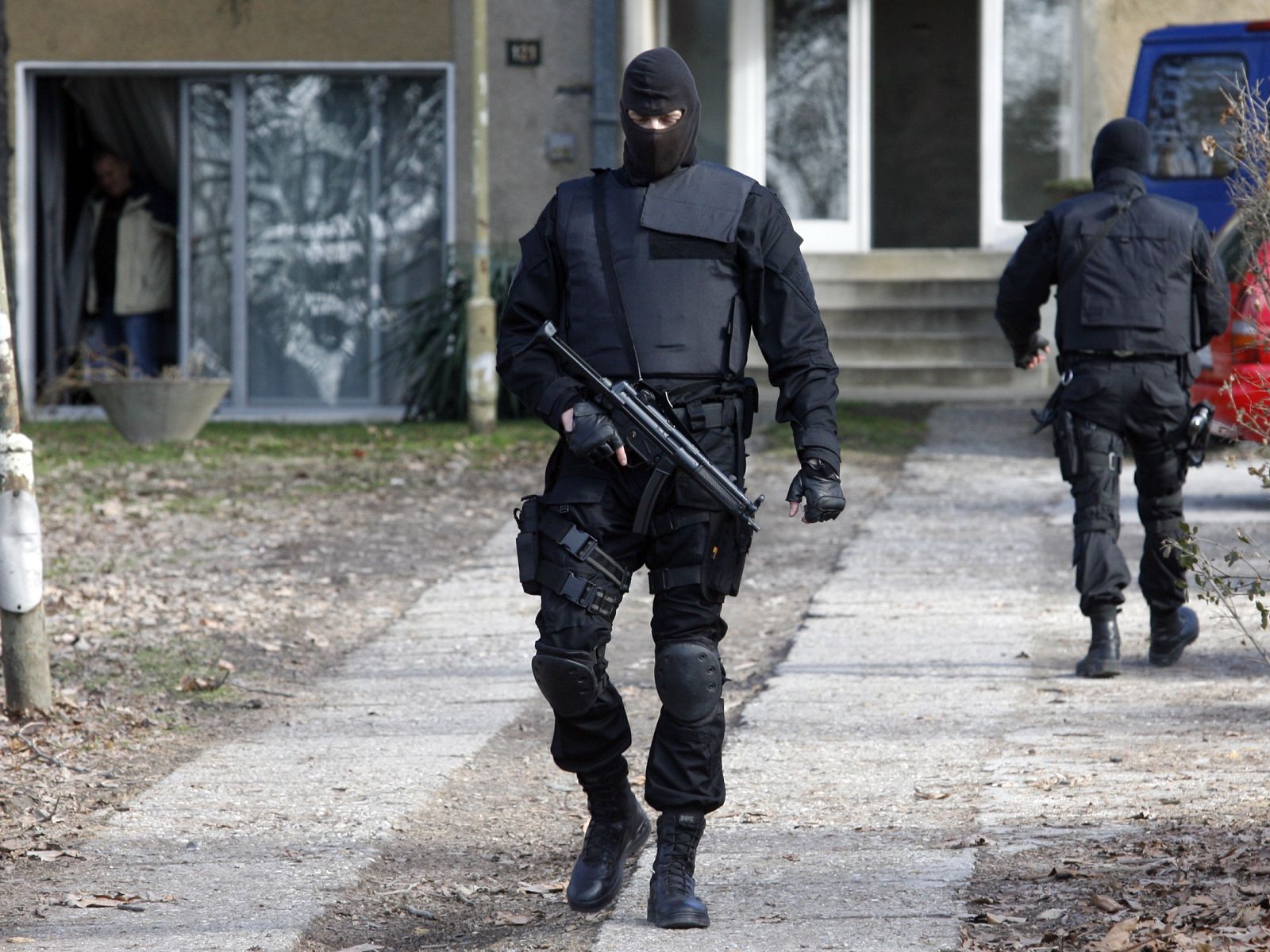 Members of Serbia's anti-terrorist unit secure the area in front of the house of the son of Ratko Mladic in Belgrade