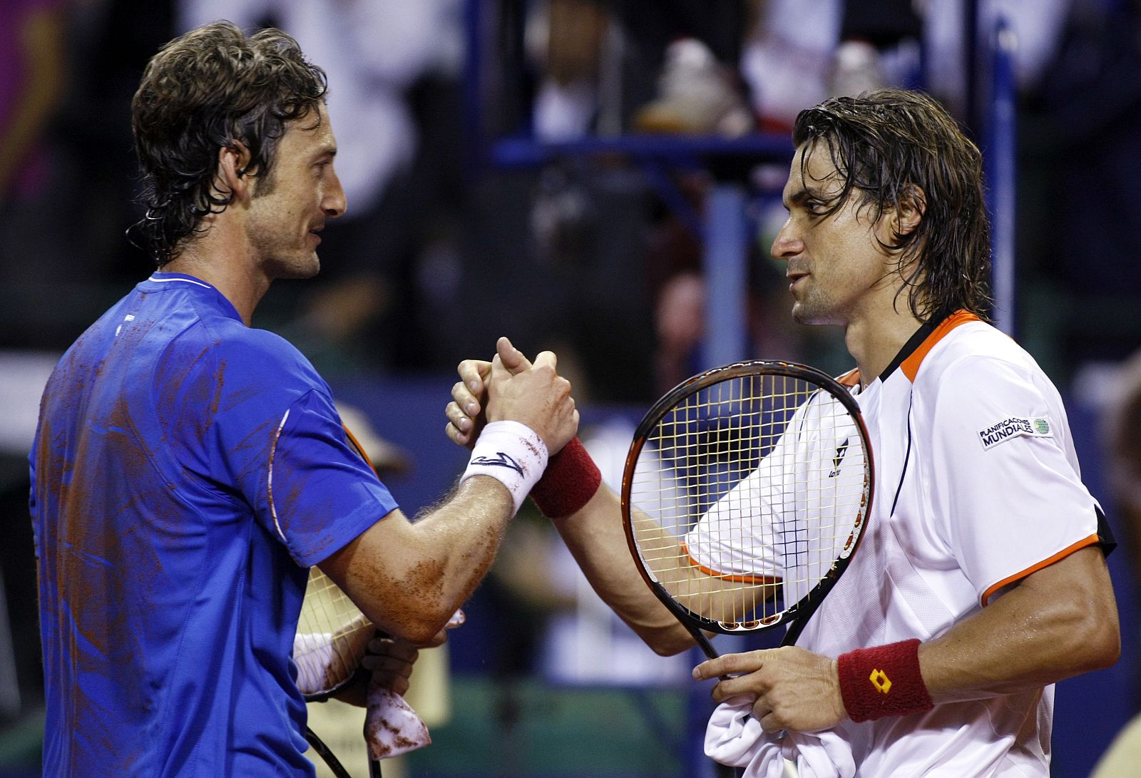 Ferrer of Spain congratulates compatriot Ferrero at the end of their men's singles final tennis match at the ATP Buenos Aires Open
