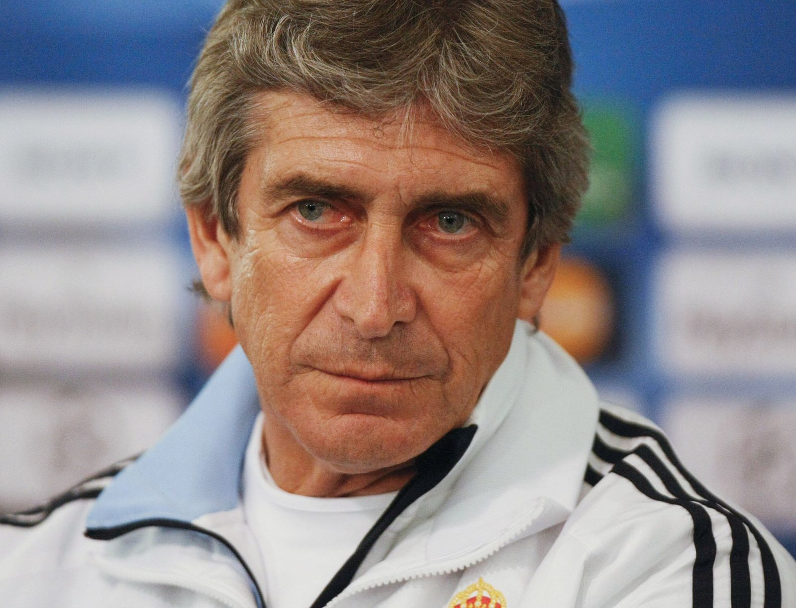Real Madrid's coach Pellegrini addresses the media before a training session for their Champions League soccer match against Olympique Lyon in Lyon