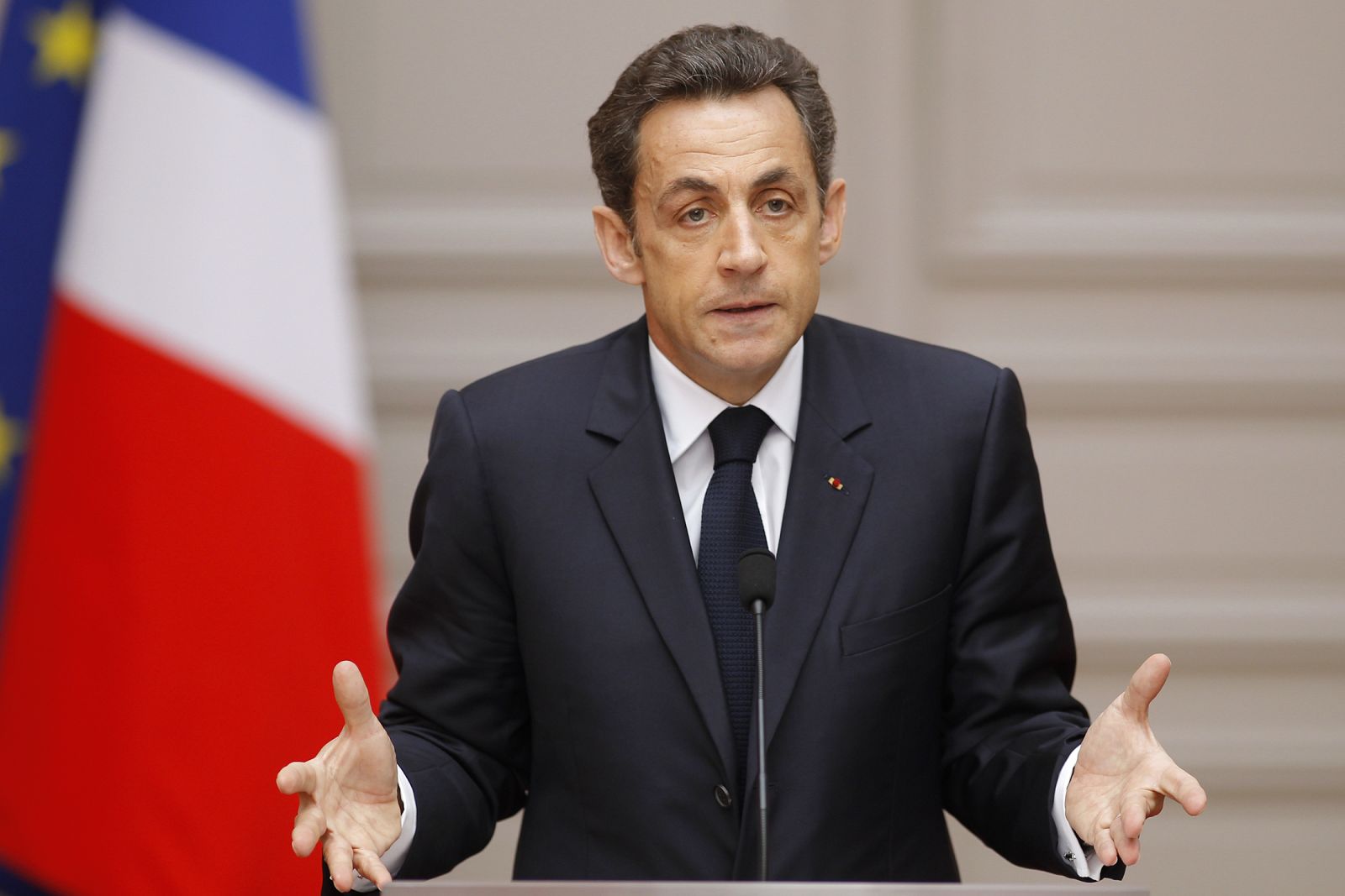 France's President Nicolas Sarkozy delivers a speech after the weekly cabinet meeting at the Elysee Palace in Paris