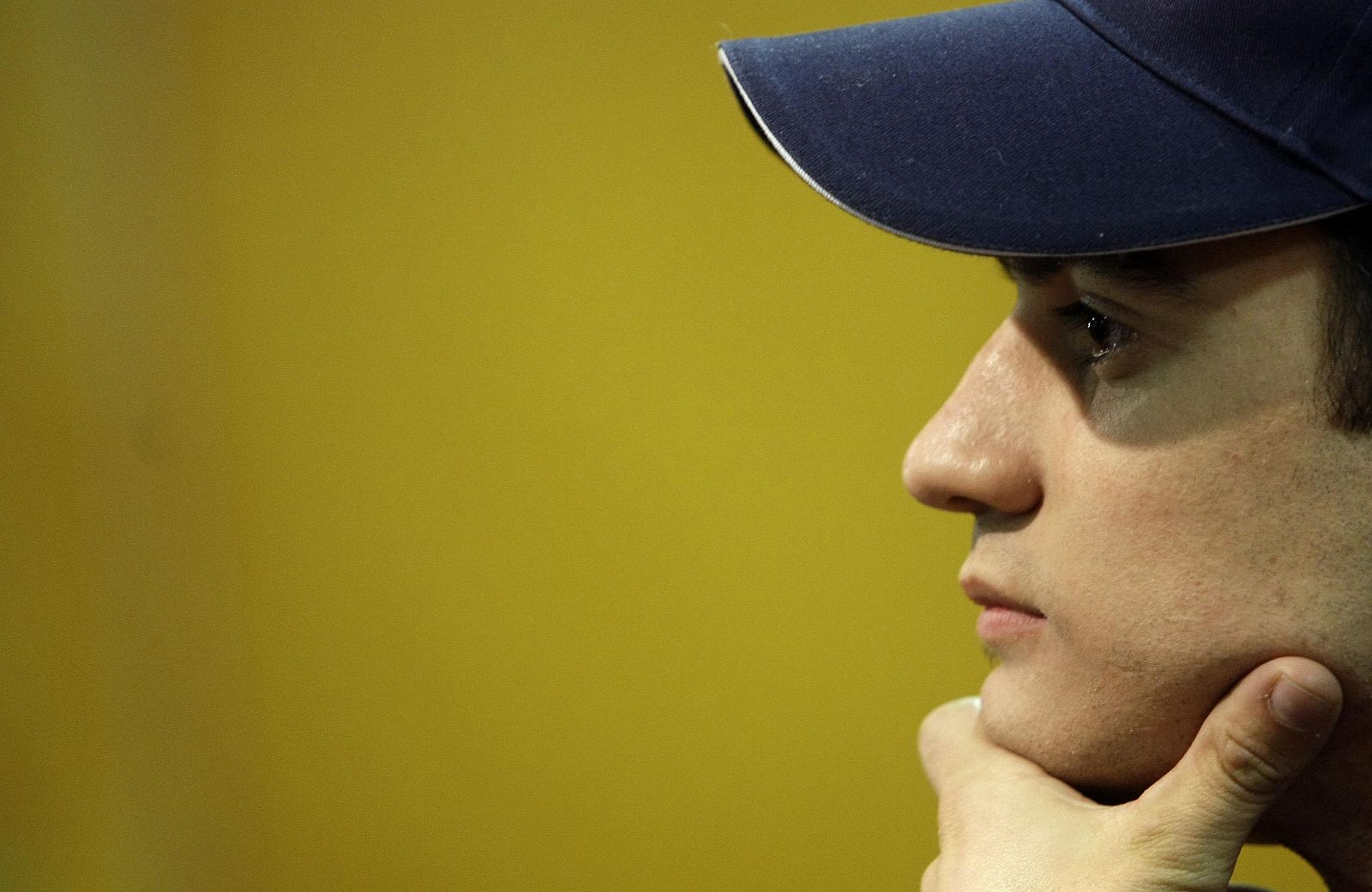 MotoGP rider Pedrosa of Spain listens to a question during a news conference before the presentation of the MotoGP Honda Repsol Team in Madrid