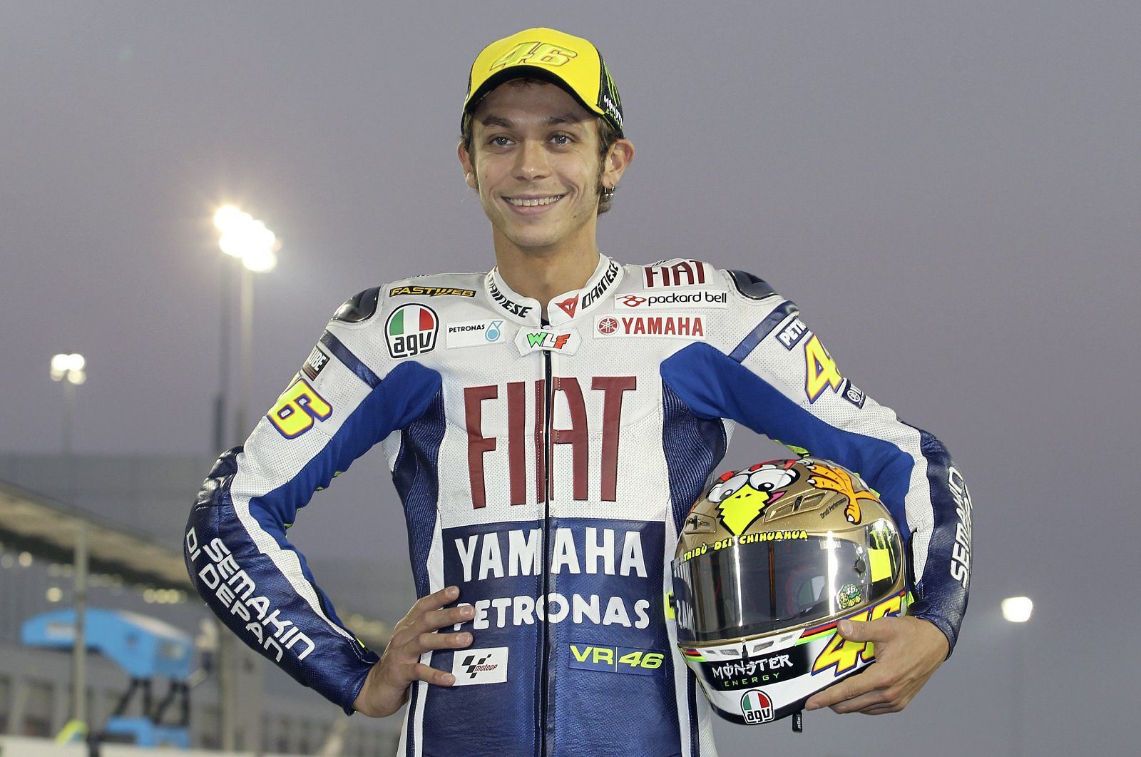 Yamaha MotoGP rider Valentino Rossi of Italy poses for photographers before a training session at the MotoGP World
